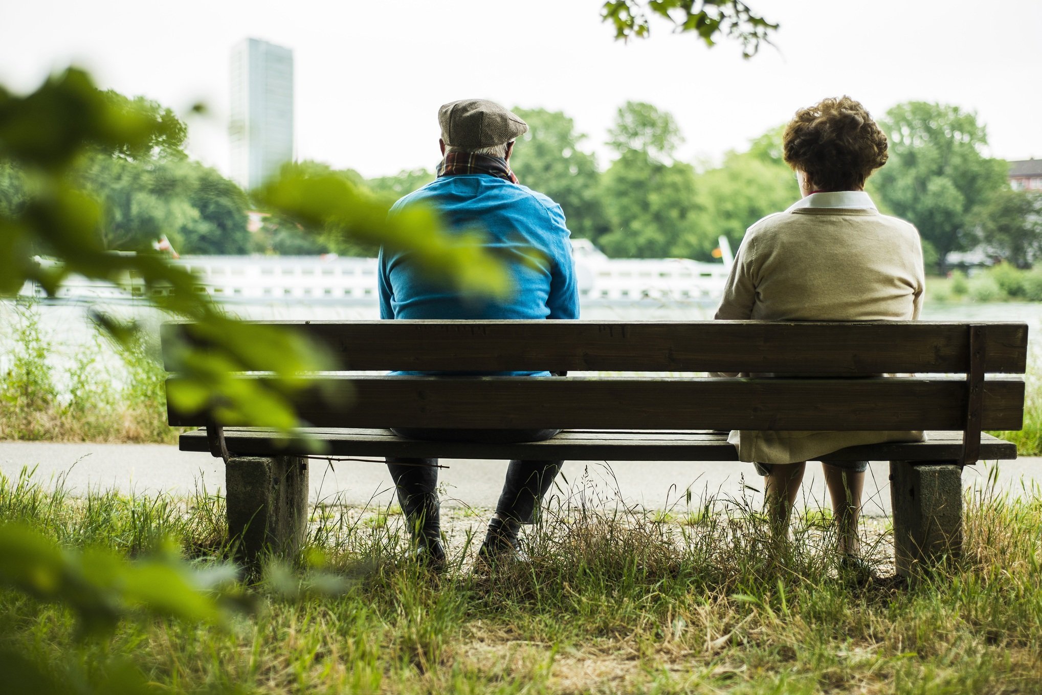 back-view-of-senior-couple-sitting-on-a-bench-2026-03-09-05-22-18-utc