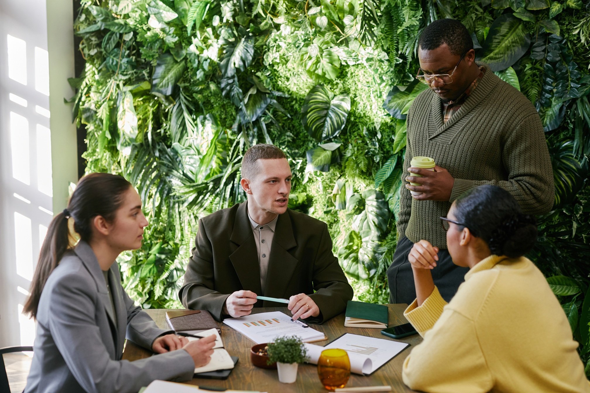 business-meeting-with-green-wall-background-2026-03-25-07-47-56-utc