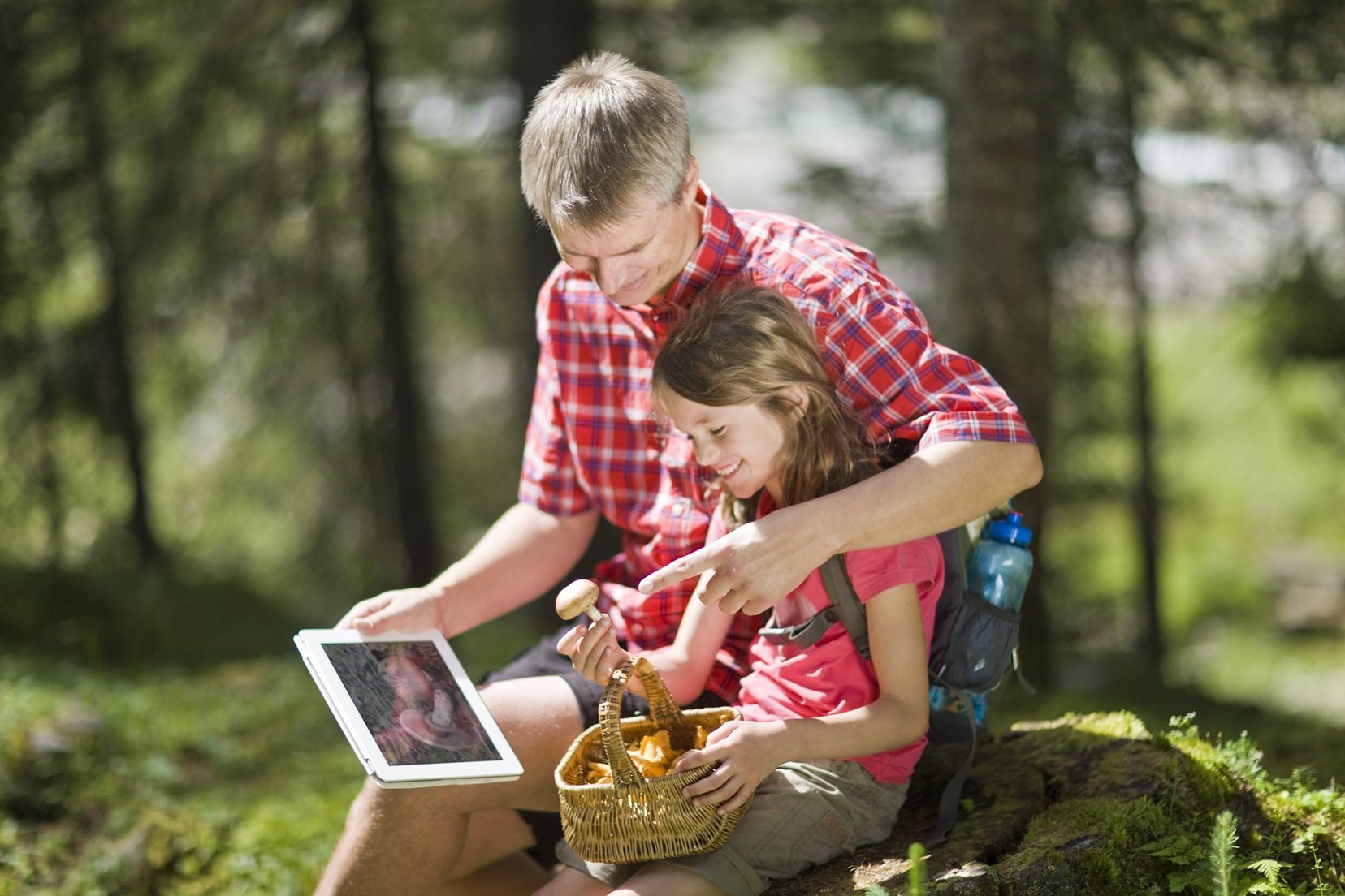 father-and-daughter-foraging-for-mushrooms-in-fore-2026-03-26-08-52-29-utc