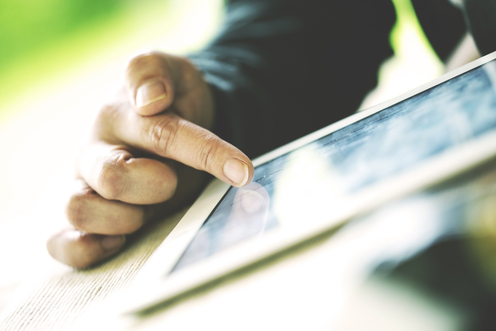 finger-taps-a-screen-in-bright-office-setting-2026-03-25-23-42-44-utc