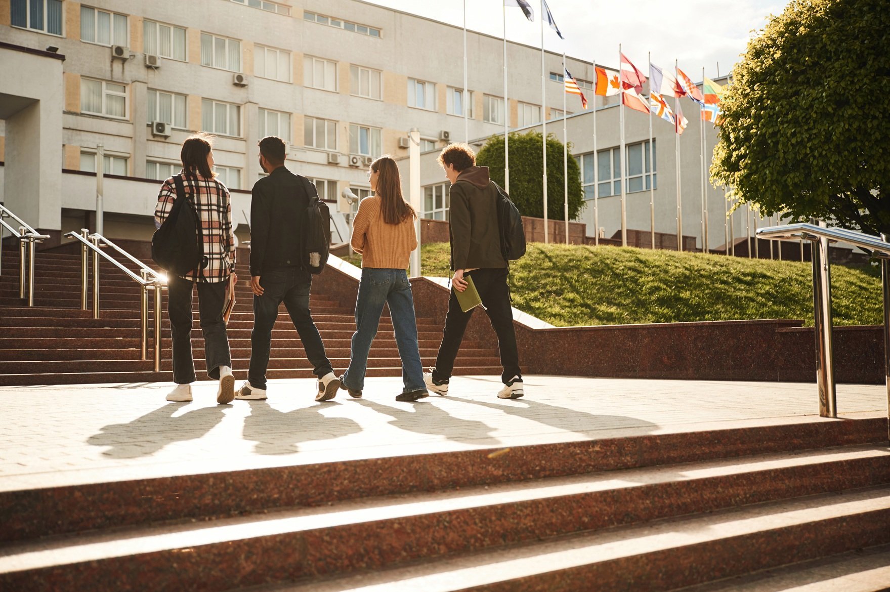 going-to-the-university-on-the-stairs-four-young-2026-03-24-03-20-57-utc