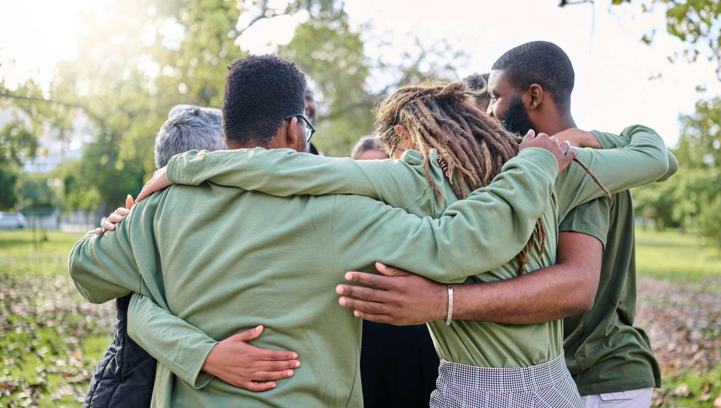 group-hug-support-and-people-in-park-for-eco-frie-2026-01-09-09-53-19-utc