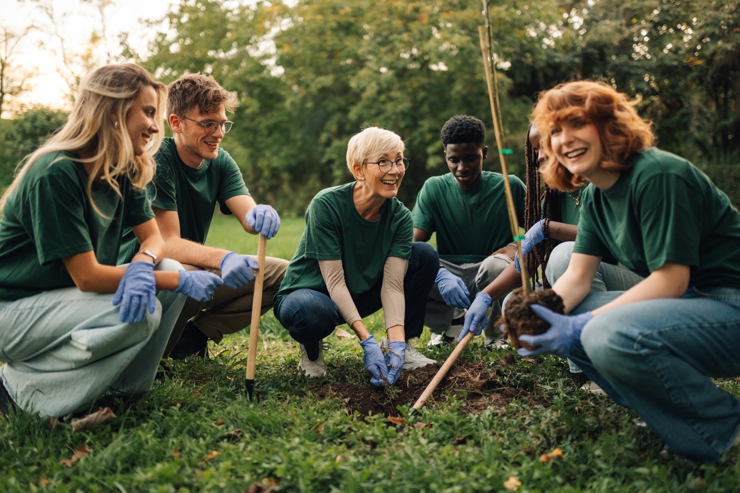group-of-volunteers-planting-trees-in-park-2026-01-09-11-13-33-utc