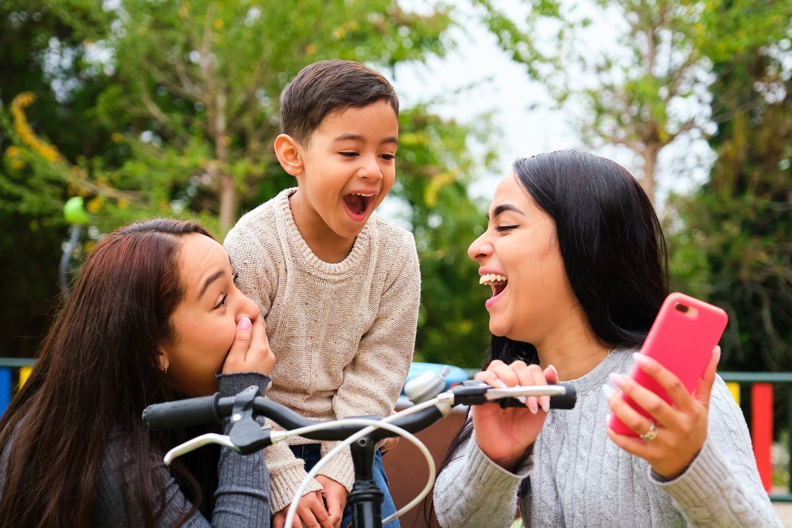 lesbian-couple-with-their-son-laughing-watching-a-2026-01-08-22-29-51-utc