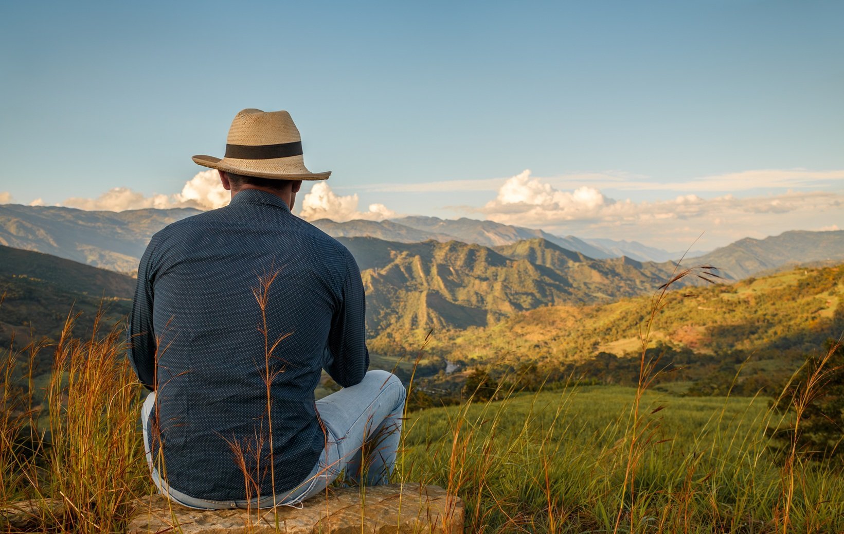 man-enjoying-serene-mountain-landscape-at-sunset-2026-03-17-06-24-22-utc