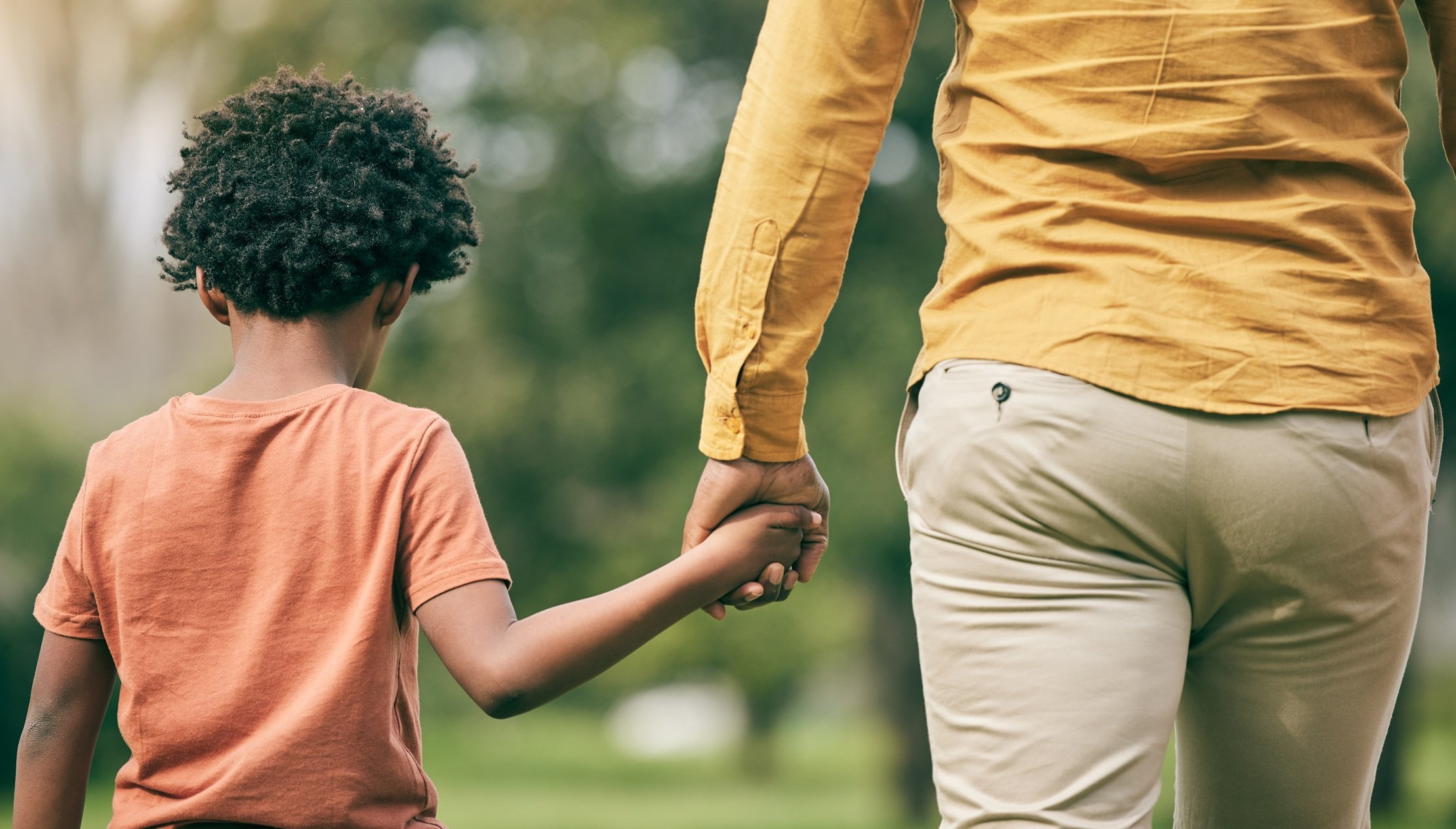 park-holding-hands-and-back-of-child-parent-and-2026-03-25-02-16-35-utc