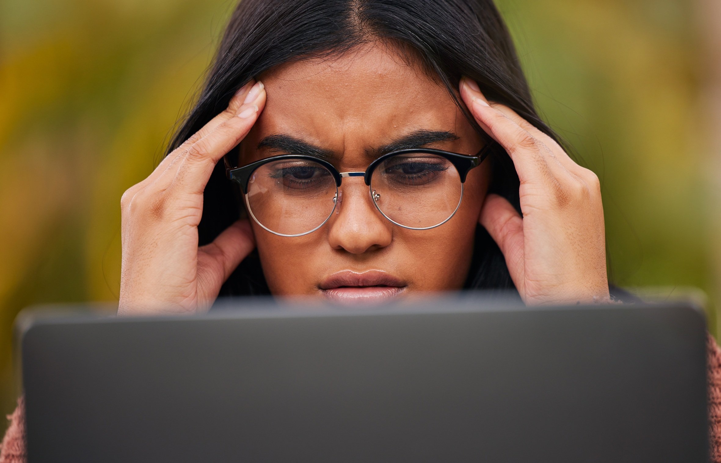 work-stress-and-burnout-woman-in-glasses-at-comp-2026-01-09-10-50-04-utc